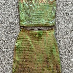 2 piece dress with sequence. Fit to small. Used but in good condition